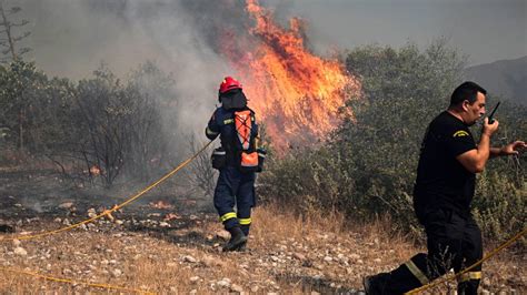 Two die in Greece plane crash as fires burn around Med .